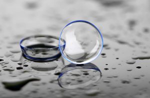 contact lenses on wet smooth surface